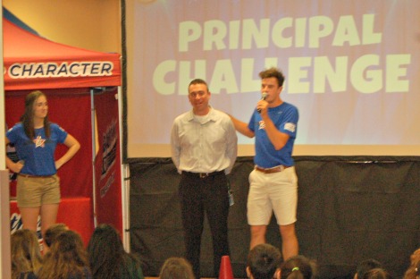 principal and announcer at pep rally