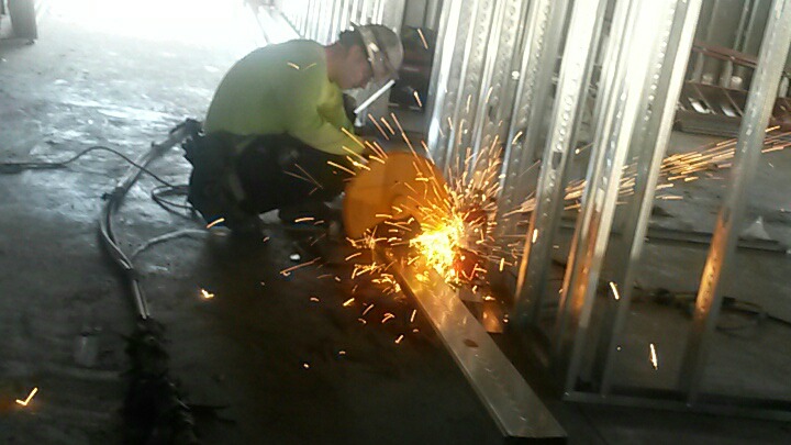 man operating chopsaw