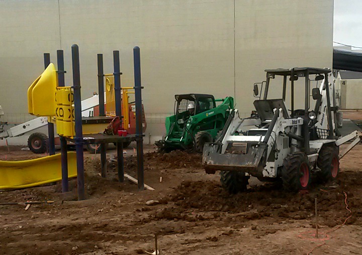 backhoes working on new playground